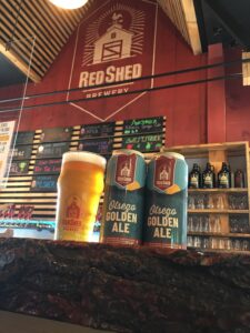 beer and cans to-go on the bar at Red Shed Brewery in Cooperstown, NY